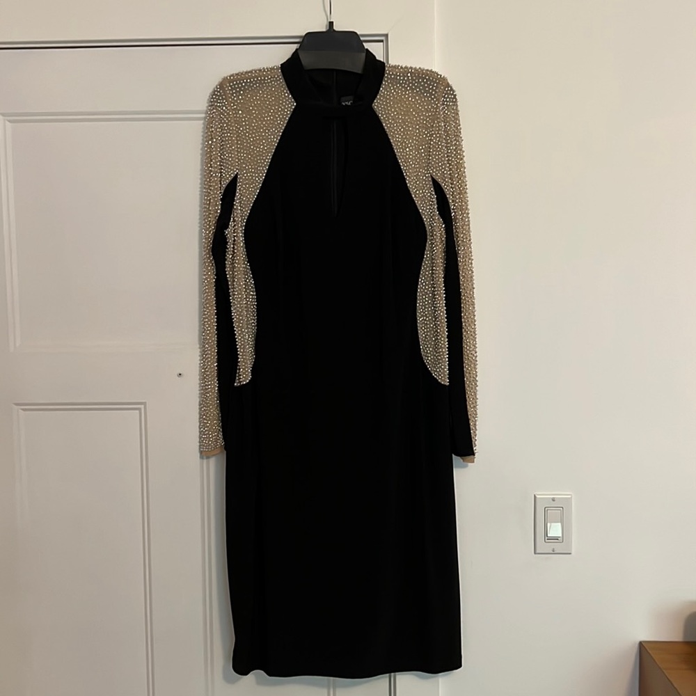 Party dress with Rhinestones on the sleeves and side of the dress